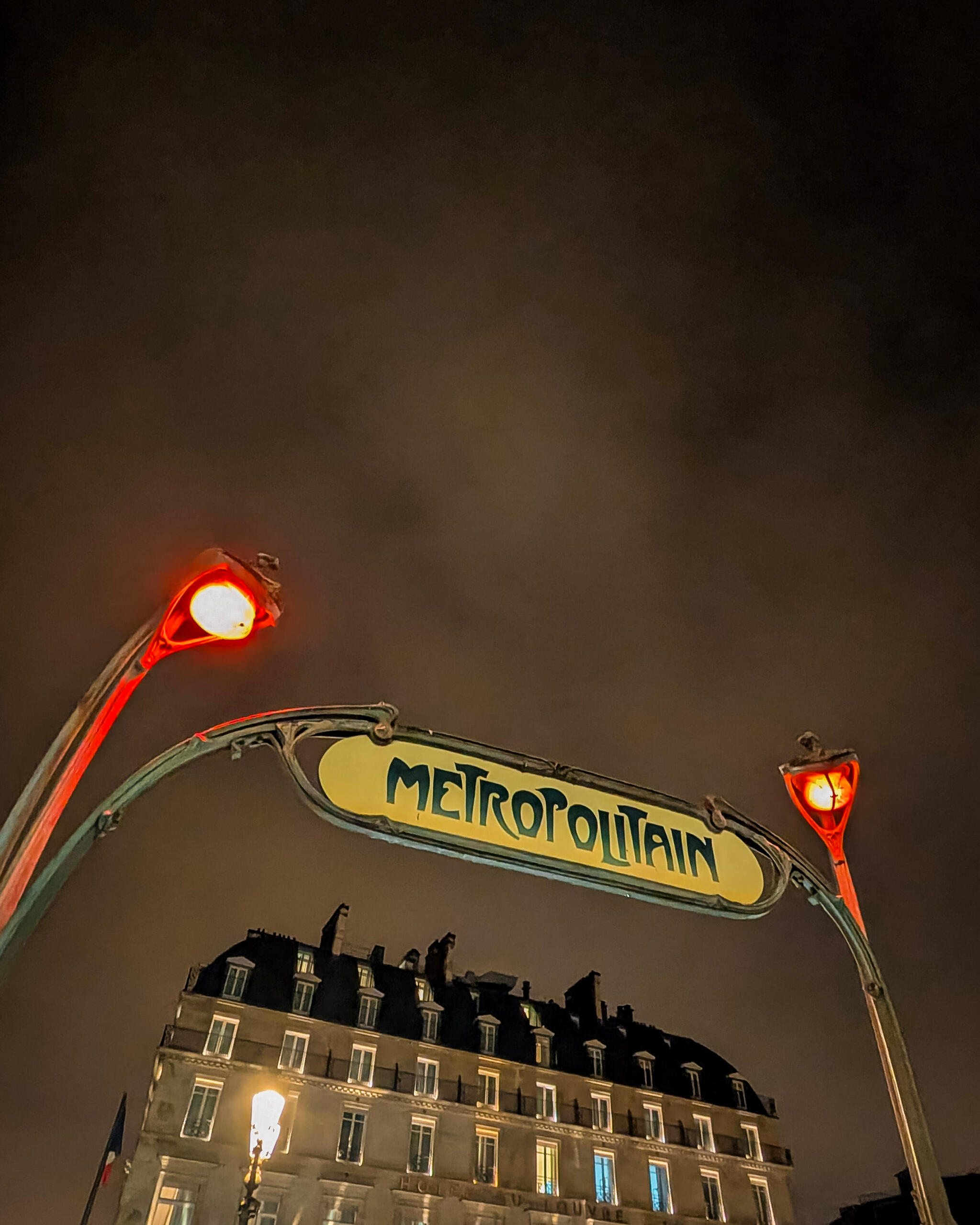Paris Metro entrance at night Paris Metro entrance at night